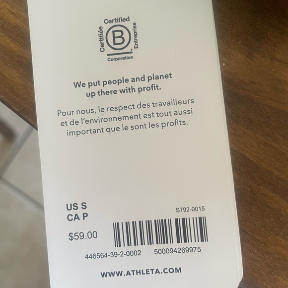 Light blue Athleta workout top. Never worn with tags. Size small. - Picture 5 of 5